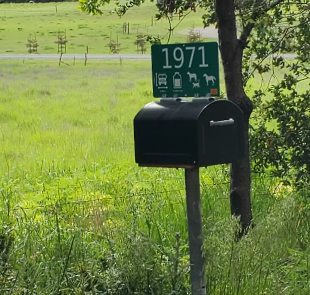 Fire Safe Sign 1971 mounted above a rural mailbox